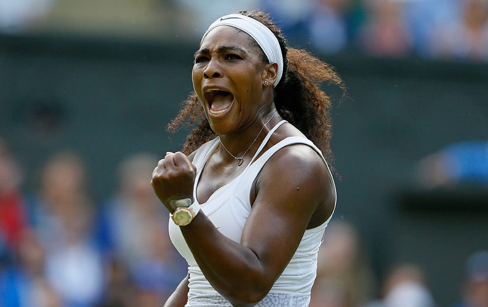 Serena Williams of the United States celebrates after winning a point against Heather Watson of Britain during their singles match at the All England Lawn Tennis Championships in Wimbledon.