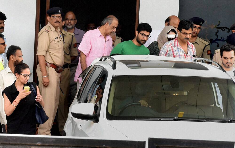 BJP MP and Bollywood actor Hema Malini, injured in an accident in Dausa district of Rajasthan, arrives in Mumbai after being discharged from a hospital in Jaipur. Bollywood actress Esha Deol, her husband Bharat and Ahanas husband Vaibhav Vohra are also in picture.