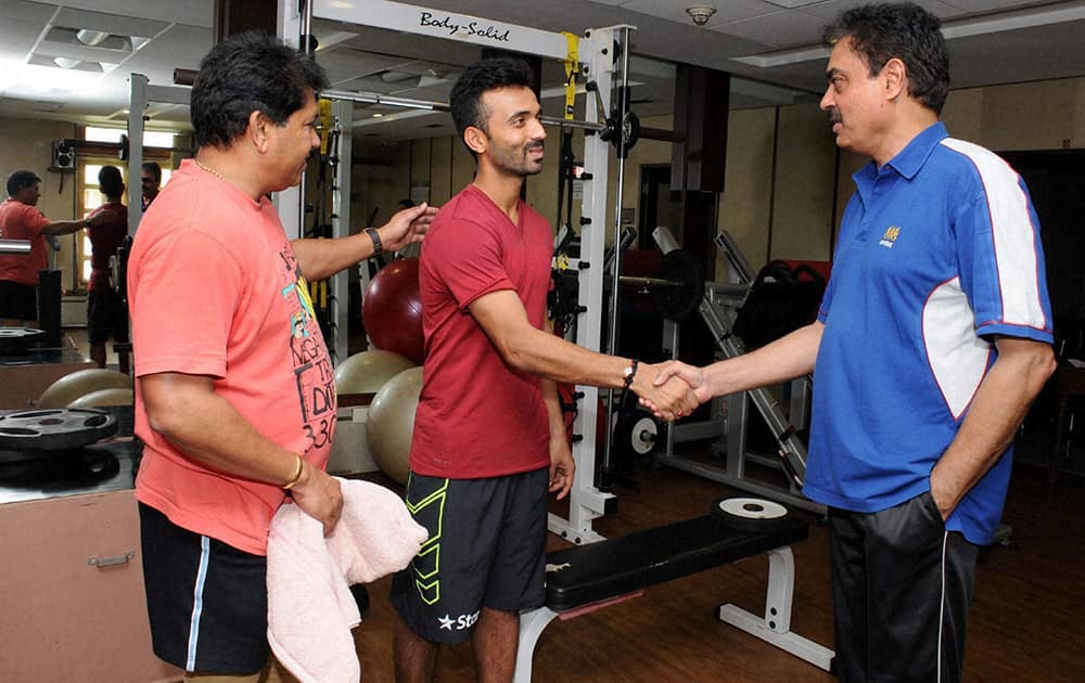 India captain Ajinkya Rahane (C) along with former captain Dilip Vengsarkar (R) and former keeper Chandrant Pandit at BKC in Mumbai, ahead of the Zimbabwe tour.