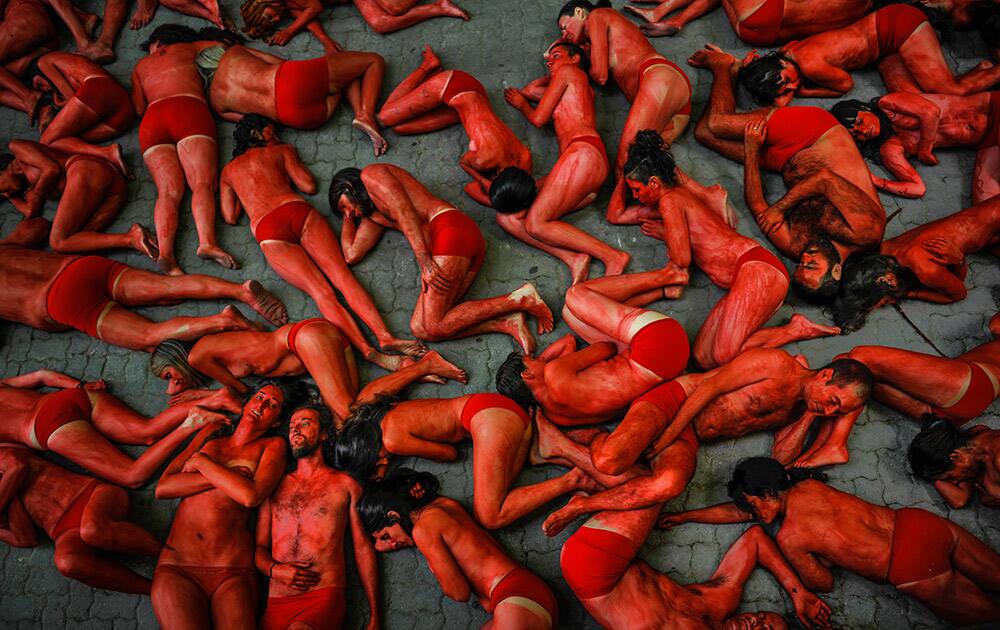 People protest against bull runs beside the bull ring a few days ahead to beginning the famous San Fermin Fiestas, in Pamplona northern Spain.