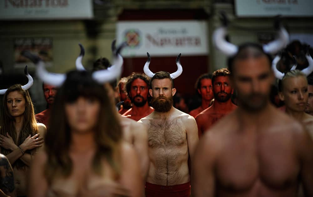 People protest against bull runs beside the bull ring a few days ahead to beginning the famous San Fermin Fiestas, in Pamplona northern Spain.