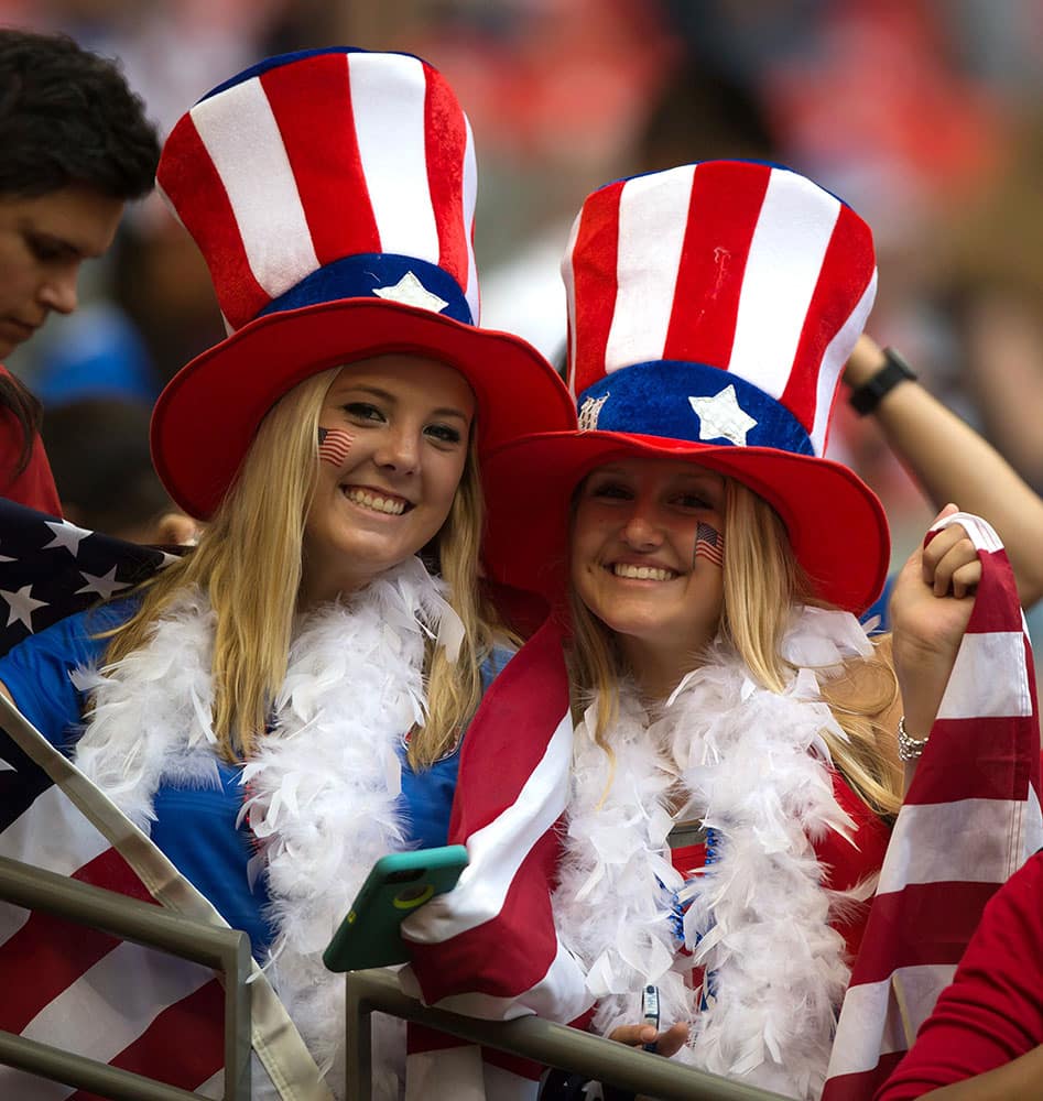 Fans of the United States wait for the U.S. and Japan to play in the FIFA Women's World Cup soccer championship in Vancouver, British Columbia, Canada.