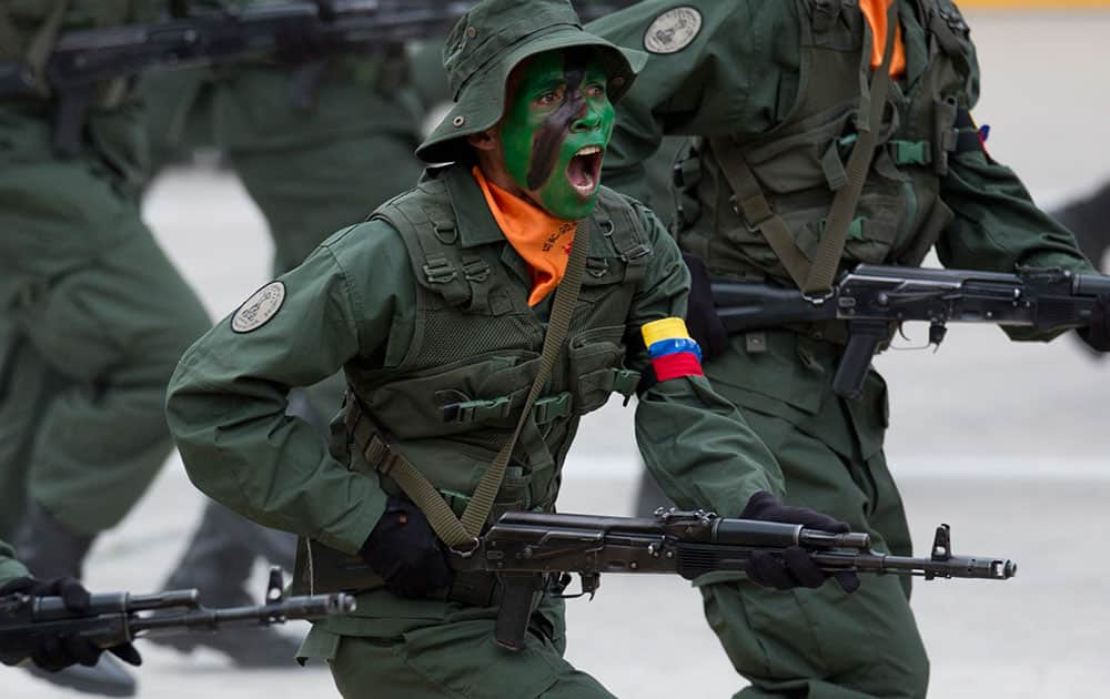 Soldiers march during a parade marking Venezuela's Independence Day in Caracas, Venezuela.