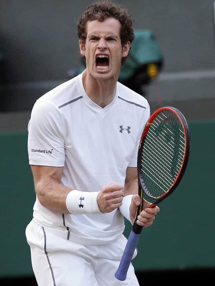 Andy Murray of Britain celebrates after winning a point against Andreas Seppi of Italy during their singles match at the All England Lawn Tennis Championships in Wimbledon, London.