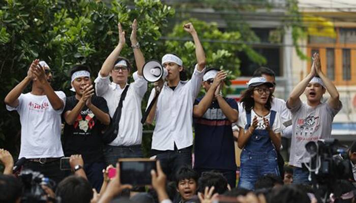 Thai military court releases 14 student protesters