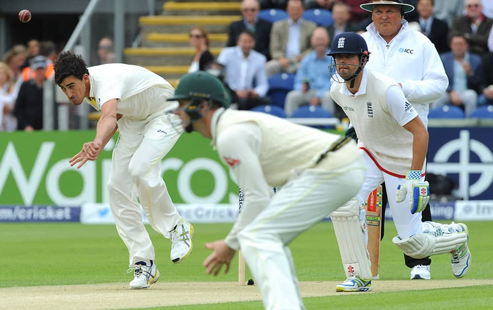 Australia’s Mitchell Starc bowling to England's Adam Lyth on day one of the first Ashes Test cricket match, in Cardiff, Wales.