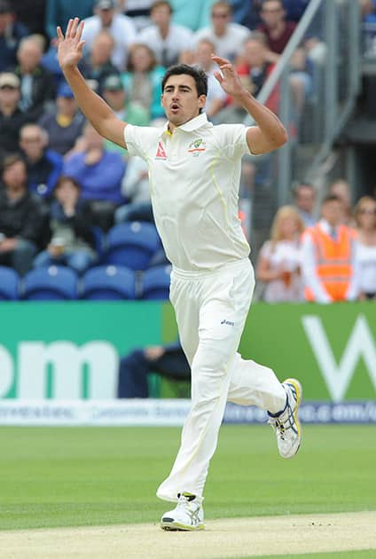 Australia’s Mitchell Starc reacts after bowling to England’s Adam Lyth in the first over on day one of the first Ashes Test cricket match, in Cardiff, Wales.