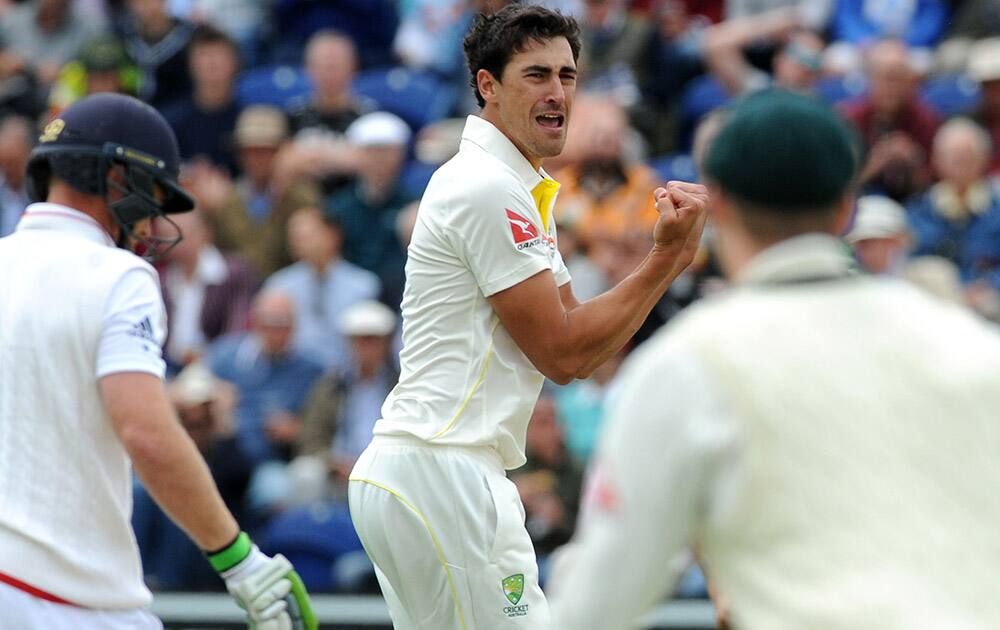 Australia’s Mitchell Starc celebrates after getting England's Ian Bell LBW for one run during day one of the first Ashes Test cricket match, in Cardiff, Wales.