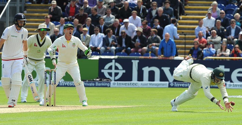 Australia’s Steve Smith drops a catch off England’s Joe Root during day one of the first Ashes Test cricket match, in Cardiff, Wales.