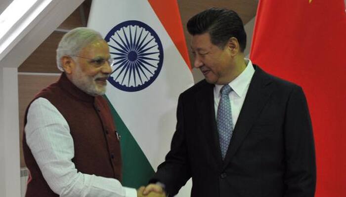 Modi meets Xi, takes up China blocking UN action against Pak over Lakhvi issue