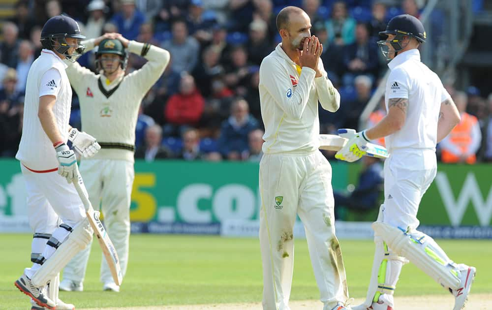 Australia’s Nathan Lyon reacts during day one of the first Ashes Test cricket match, in Cardiff, Wales.