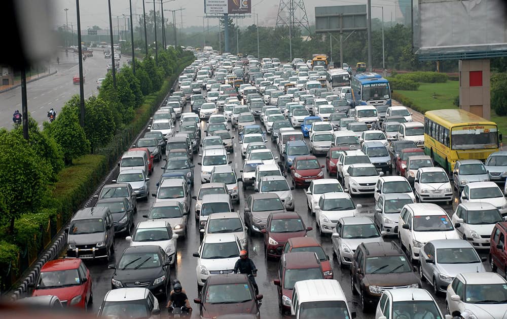 A view of a traffic jam on Greater Noida Expressway due to rainfall in greater Noida.