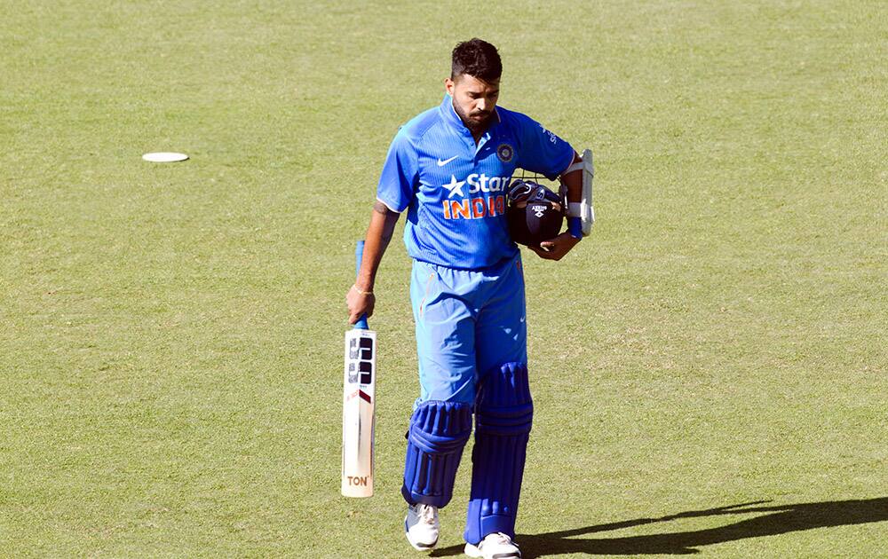 Murali Vijay walks off the pitch after been caught during the first One Day International against Zimbabwe in Harare.