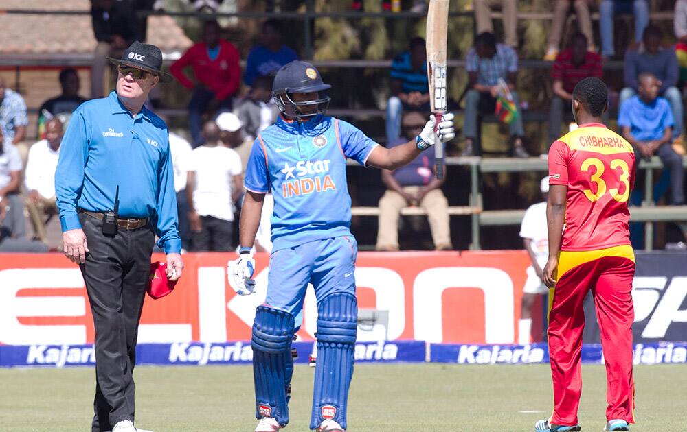 Ambati Rayudu celebrates after scoring 100 runs during the One Day International against Zimbabwe in Harare.