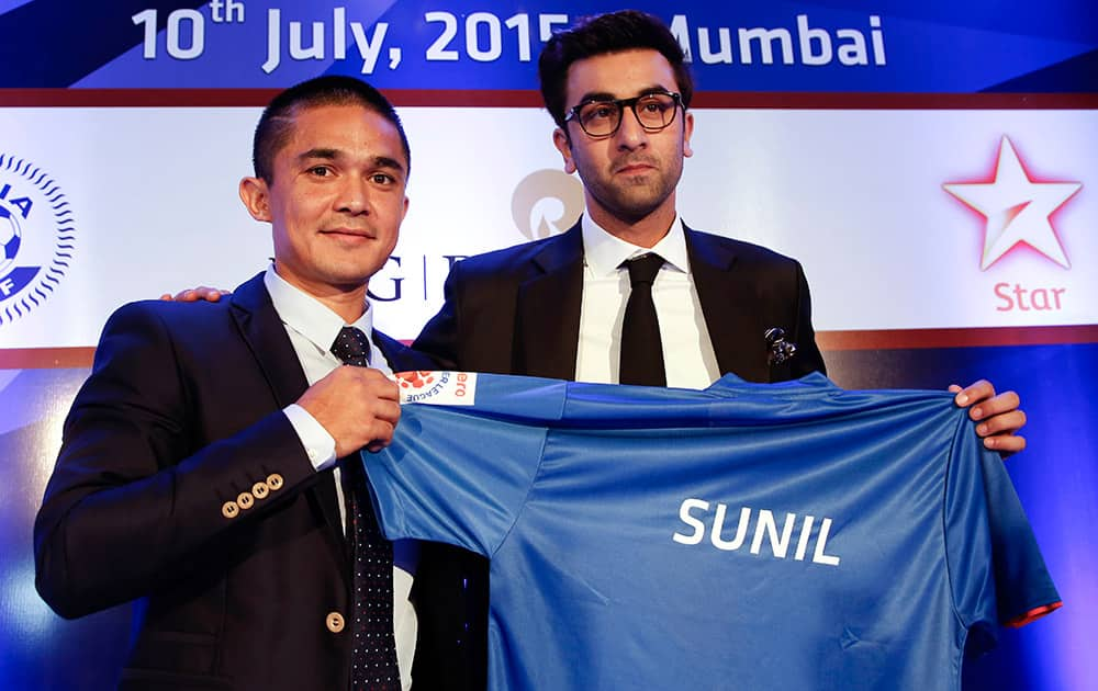 Sunil Chhetri poses with Bollywood actor and co-owner of Mumbai City FC, Ranbir Kapoor, during an auction of players for the Indian Super League in Mumbai.