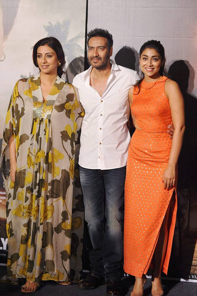 Bollywood actors Ajay Devgn, Tabu and Shriya Saran during the poster and song launch of their upcoming film ‘Drishyam’ in Mumbai.