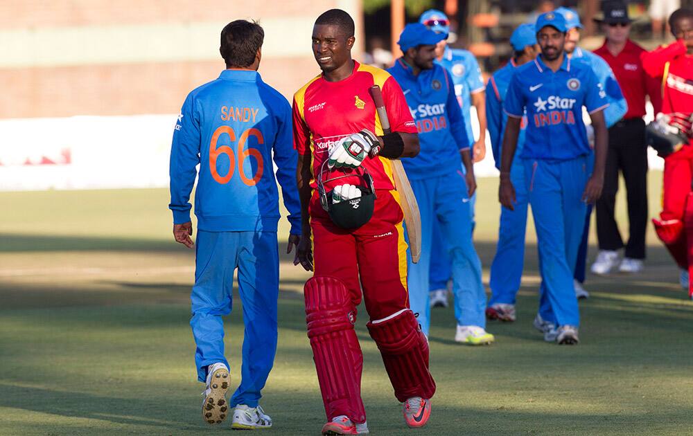 Zimbabwean cricket captain Elton Chigumbura, walks off the pitch after losing to India in their One Day International in Harare, Zimbabwe.