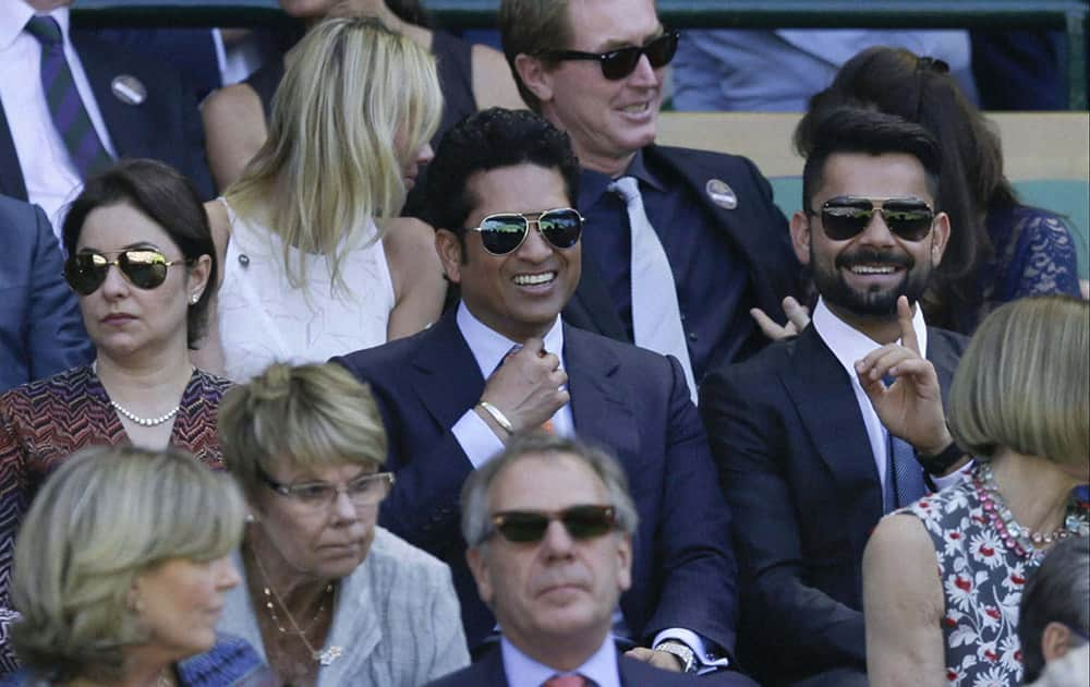 SACHIN TENDULKAR SITS IN THE ROYAL BOX ON CENTRE COURT, AT THE ALL ENGLAND LAWN TENNIS CHAMPIONSHIPS IN WIMBLEDON.