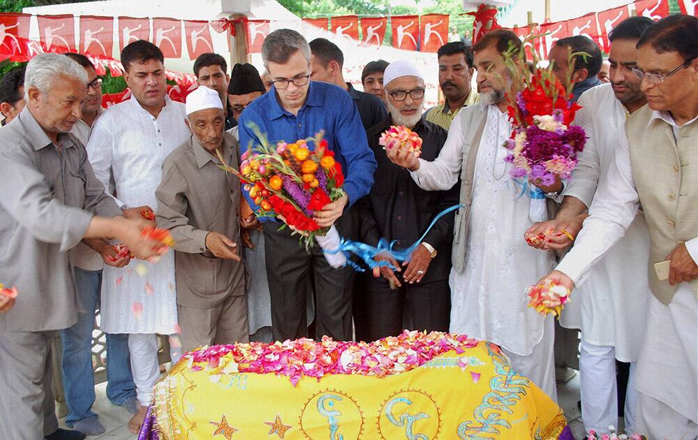National Conference working president Omar Abdullah with party leaders paying floral tribute to his grandmother Begum Akbar Jahan on her death anniversary at her graveyard.