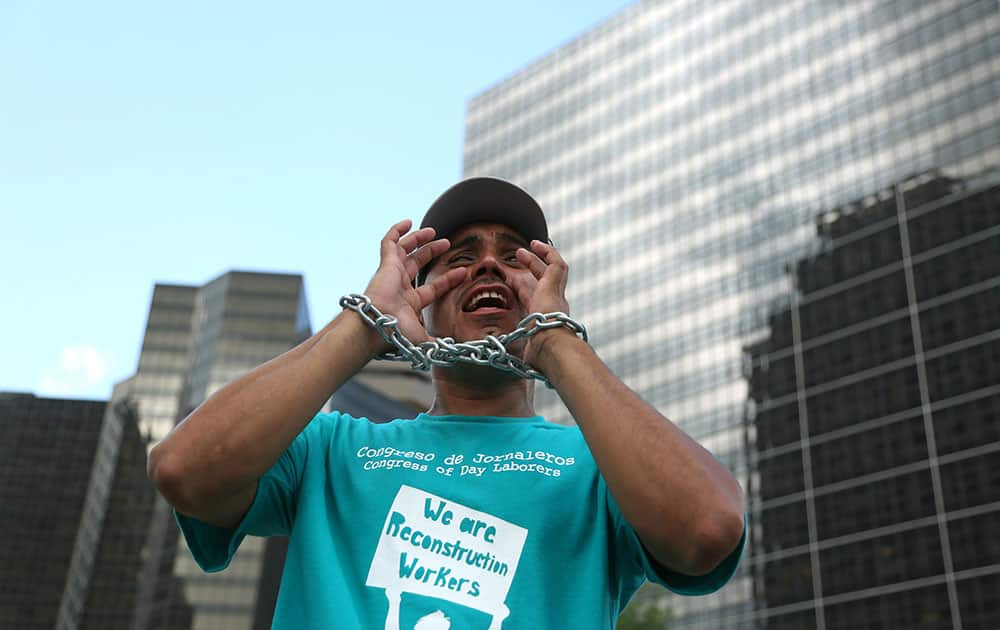 Immigration advocates rally outside the 5th U.S. Circuit Court of Appeals in New Orleans to call for an end to the delay in implementing the immigration initiatives that President Obama announced in November 2014.