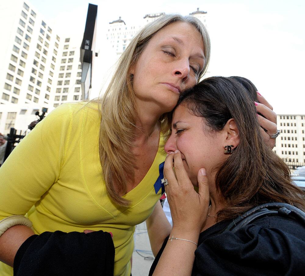 Cheryl Blades, left, of Waterford, hugs a lady who asked not to be identified after the sentencing. The lady was treated by Fata while she was pregnant twice and is still treated for an unknown condition. Thus far, her children are healthy.