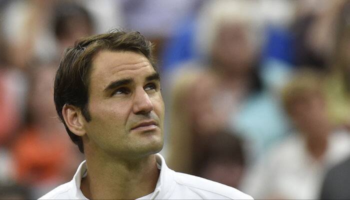 Rain to blame for Wimbledon woe, says Roger Federer