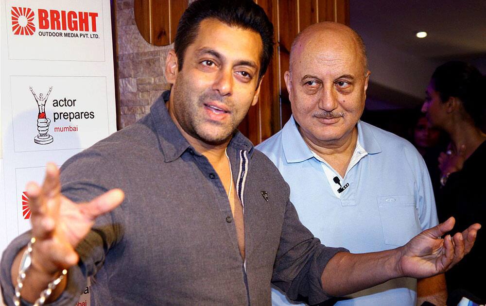 Bollywood actor Anupam Kher with Salman Khan during staging of his play Mera Woh Matlab Nahi Tha in Mumbai.