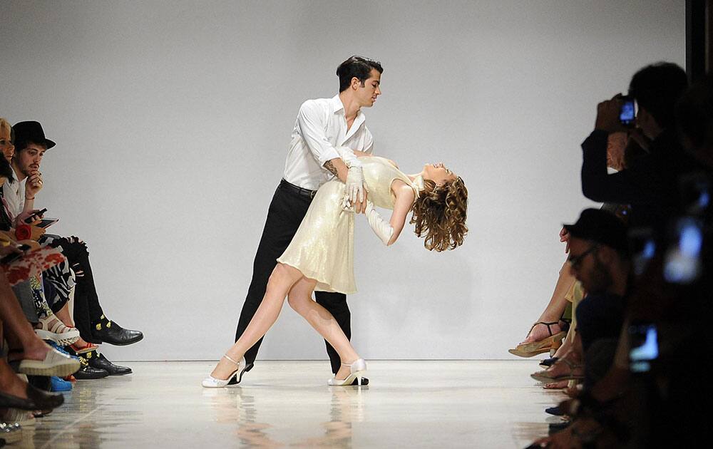 Models perform during the Ettore Bilotta women's high fashion show, presented in Rome.