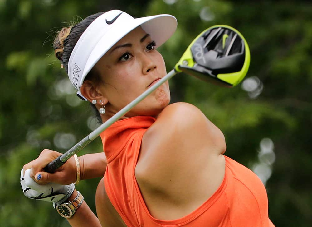 Michelle Wie hits off the second tee during the final round of the U.S. Women's Open golf tournament at Lancaster Country Club, in Lancaster, Pa. 