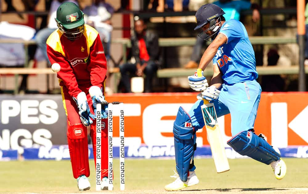 Manish Pandey plays a shot as Zimbabwean wicketkeeper prepares to catch the ball during the third One Day International cricket match against Zimbabwe in Harare, Zimbabwe.