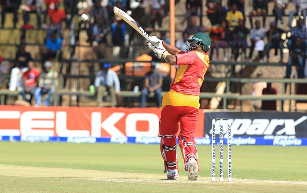 Zimbabwean batsman Hamilton Masakadza plays a shot during the third One Day International cricket match against India in Harare, Zimbabwe.