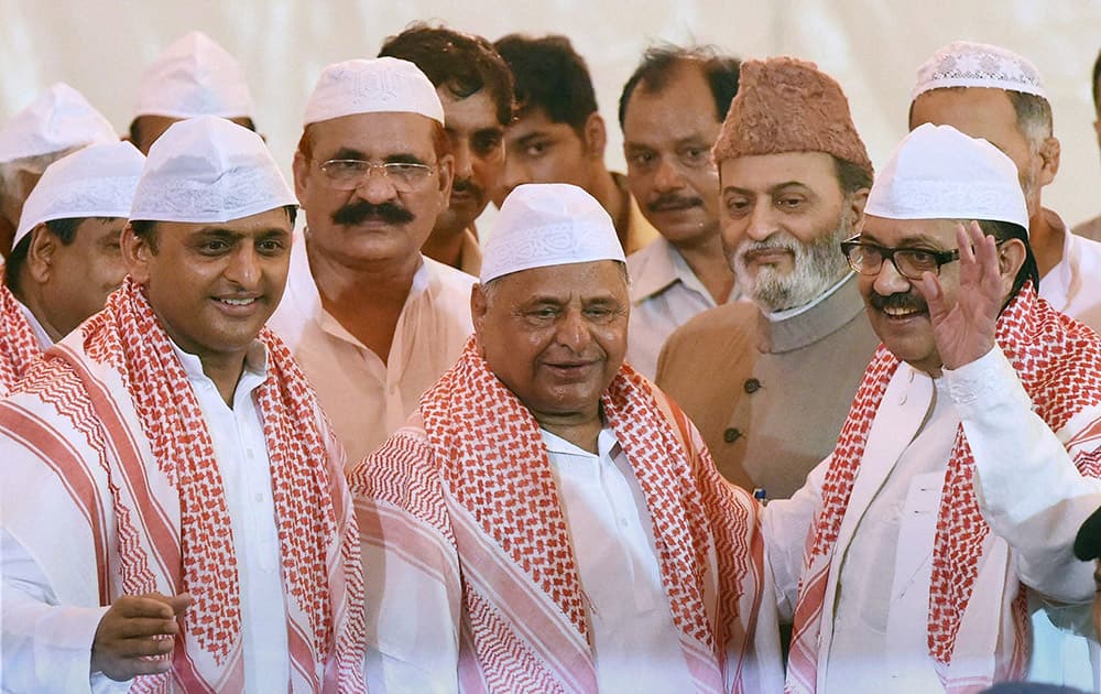 Uttar Pradesh Chief Minister Akhilesh Yadav, SP chief Mulayam Singh Yadav and Amar Singh at a Roza Iftaar party in Lucknow.