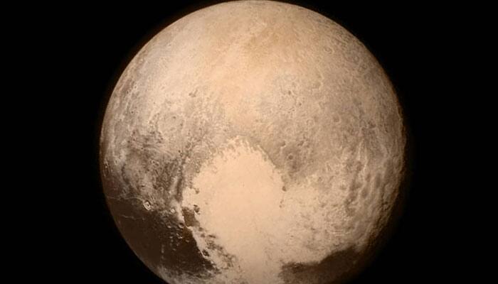 Celebrations as NASA&#039;s New Horizons calls to confirm successful Pluto flyby