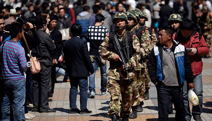 Indian among 20 tourists arrested by China over &quot;terror&quot; videos