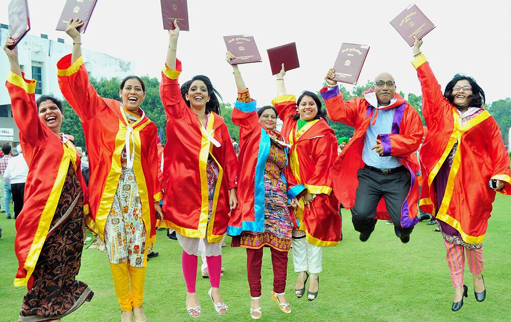 Students in jubliant mood after receiving their degrees during the Annual Convocation of Punjabi University in Patiala.