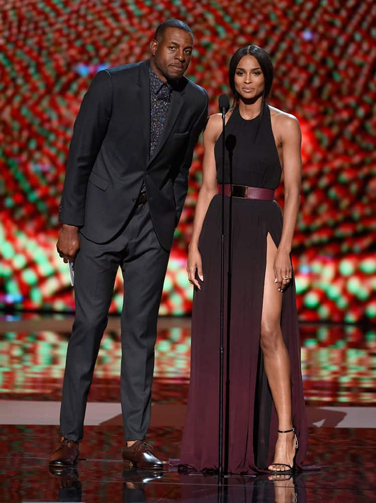 NBA player Andre Iguodala, of the Golden State Warriors, and Ciara present the award for best play at the ESPY Awards at the Microsoft Theater in Los Angeles. 