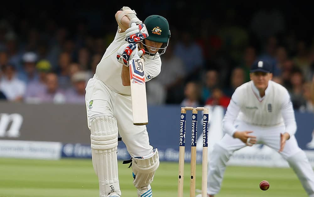 Australia's Chris Rogers plays a shot off the bowling of England's James Anderson on the first day of the second Ashes Test match between England and Australia, at Lord's cricket ground in London.