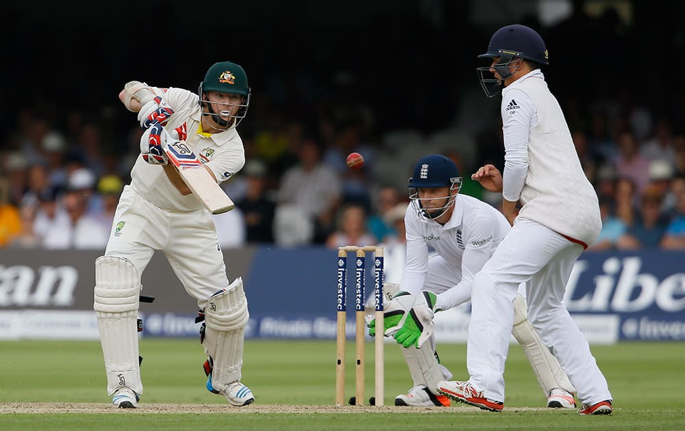 Australia's Chris Rogers plays a shot off the bowling of England's Joe Root on the first day of the second Ashes Test match between England and Australia, at Lord's cricket ground in London.