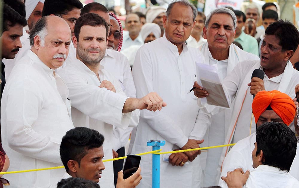 Congress Vice President Rahul Gandhi with Rajasthan Congress Chief Sachin Pilot and party leader Ashok Gehlot listening to peoples problems during his 10-km Padyatra from Khotawali to Amarasinghwala village in Hanumangarh district.