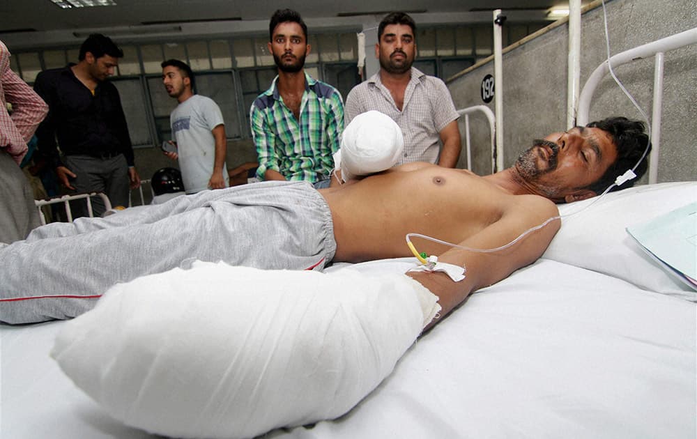 A villager injured in Pak firing being treated at a medical college hospital in Jammu.