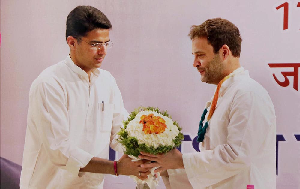 Congress Vice President Rahul Gandhi being welcomed by Rajasthan Congress Chief Sachin Pilot during the Congress officers and representatives meeting at Birla Auditorium , in Jaipur.