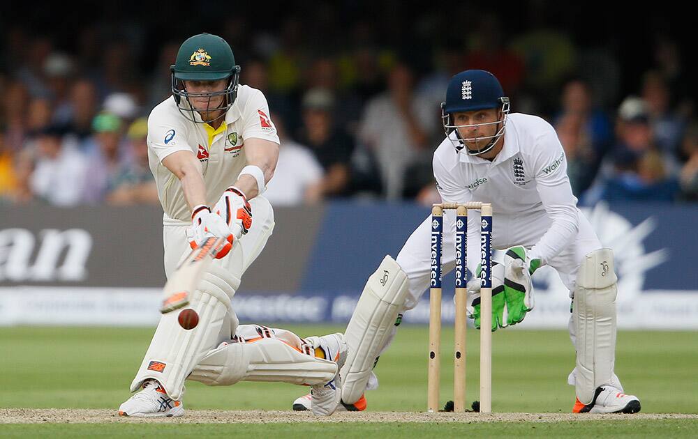 Australia's Steven Smith plays a shot off the bowling of England's Moeen Ali on the first day of the second Ashes Test match between England and Australia, at Lord's cricket ground in London.