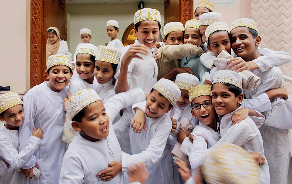 Children of Dawoodi Bohra community greet each other on the occasion of Eid-ul-Fitr festival in Bhopal.