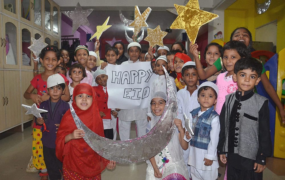 School children celebrate Eid-ul-Fitr at a school in Mirzapur.