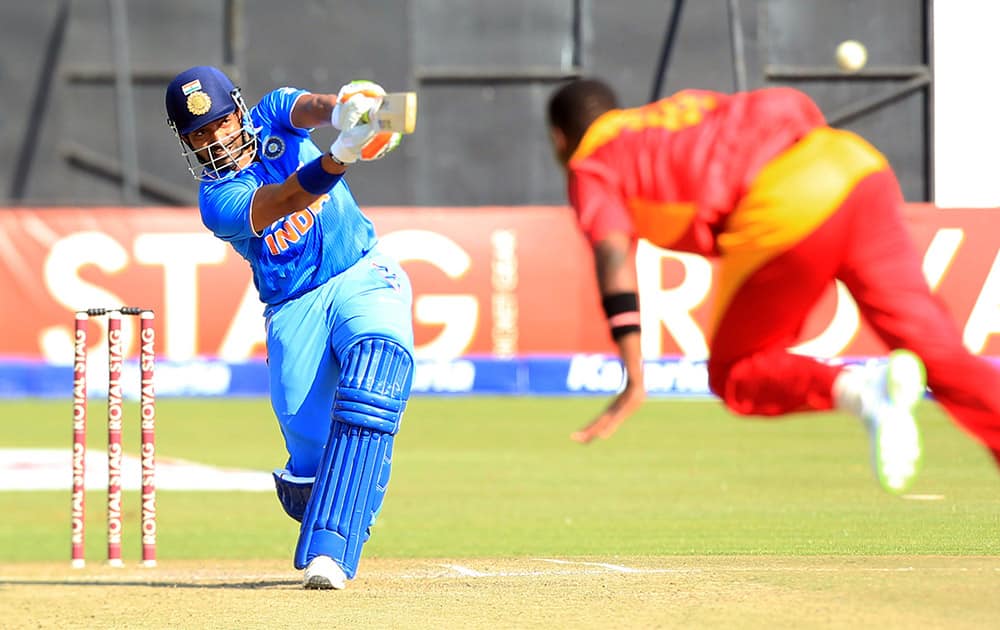 Robin Uthappa plays a shot during the Twenty20 cricket match against Zimbabwe in Harare, Zimbabwe.