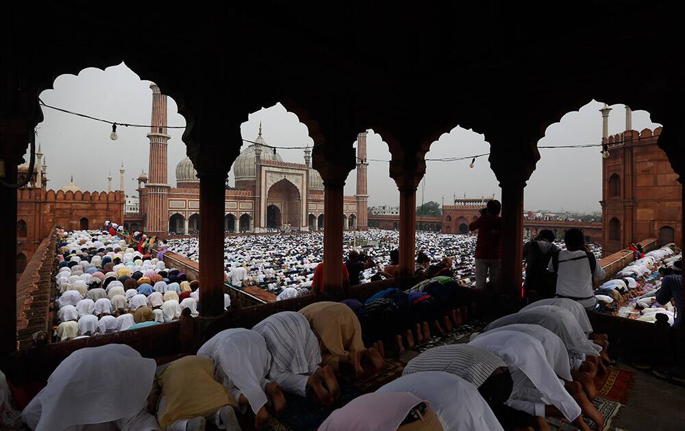 Muslims offer Eid al-Fitr prayers at Jama Masjid in New Delhi.