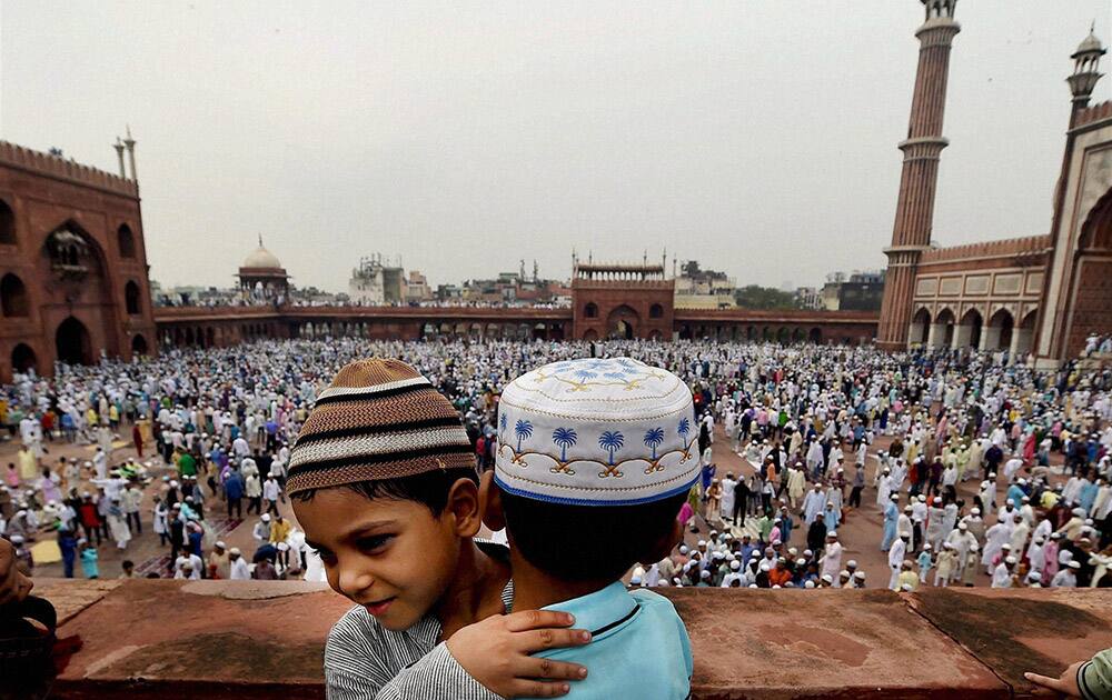 Muslims offer prayers to mark the festival of Eid al-Fitr at Jama Masjid in New Delhi.