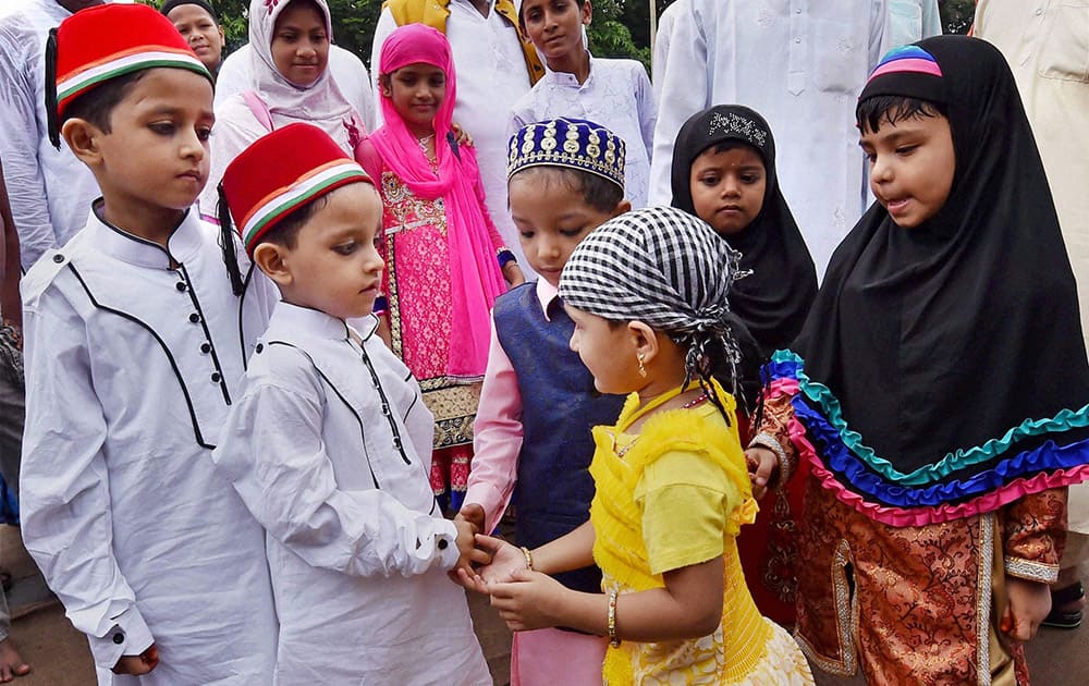 Muslims children celebrate Eid festival at Red road in Kolkata.