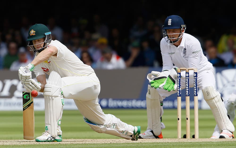 Australia's Adam Voges plays a shot off the bowling of England's Moeen Ali on the second day of the second Ashes Test match between England and Australia, at Lord's cricket ground in London.