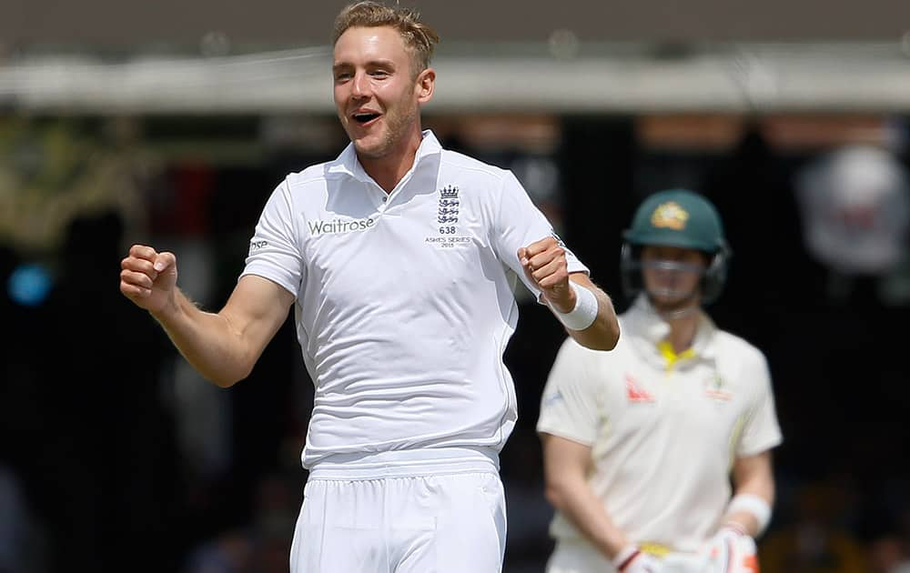 England's Stuart Broad celebrates taking the wicket of Australia's Adam Voges on the second day of the second Ashes Test match between England and Australia, at Lord's cricket ground in London.